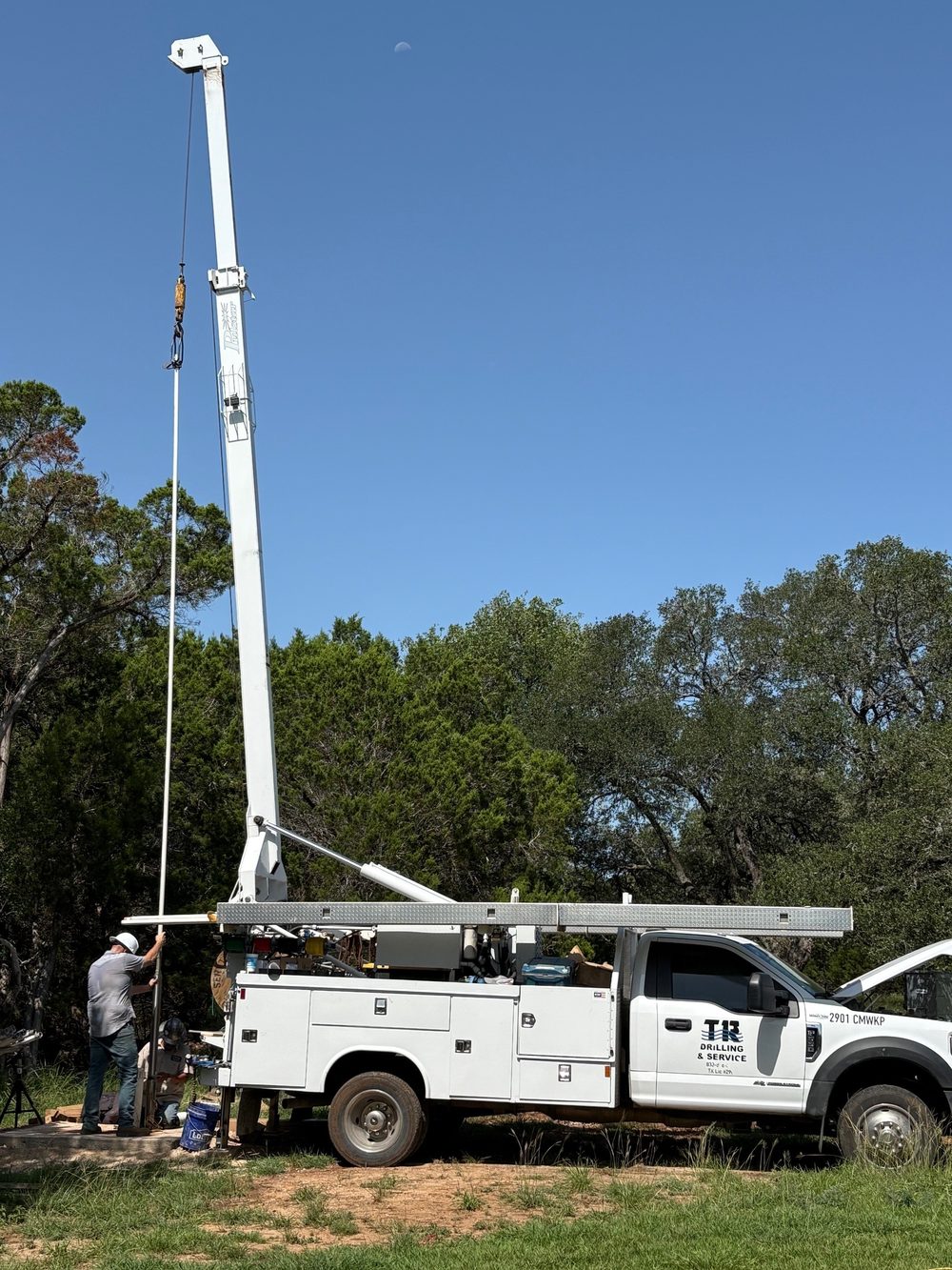 Mast raised, ready to drill