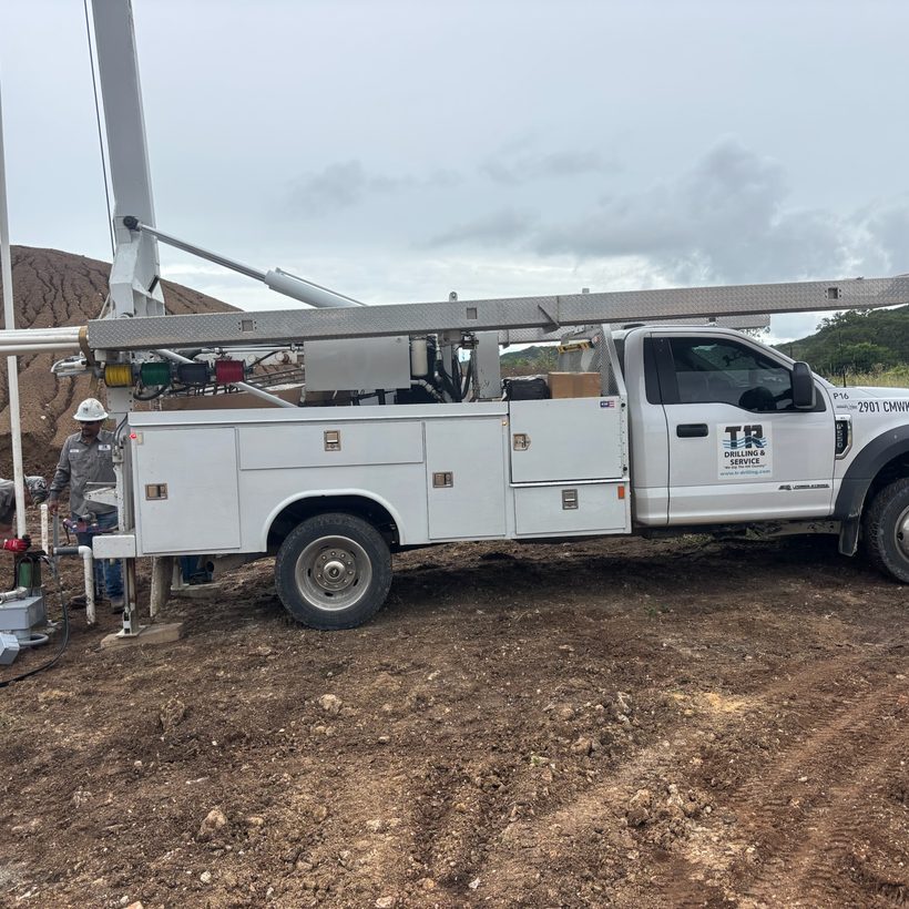 TR Drilling pump service truck pulling a pump at a Hill Country well